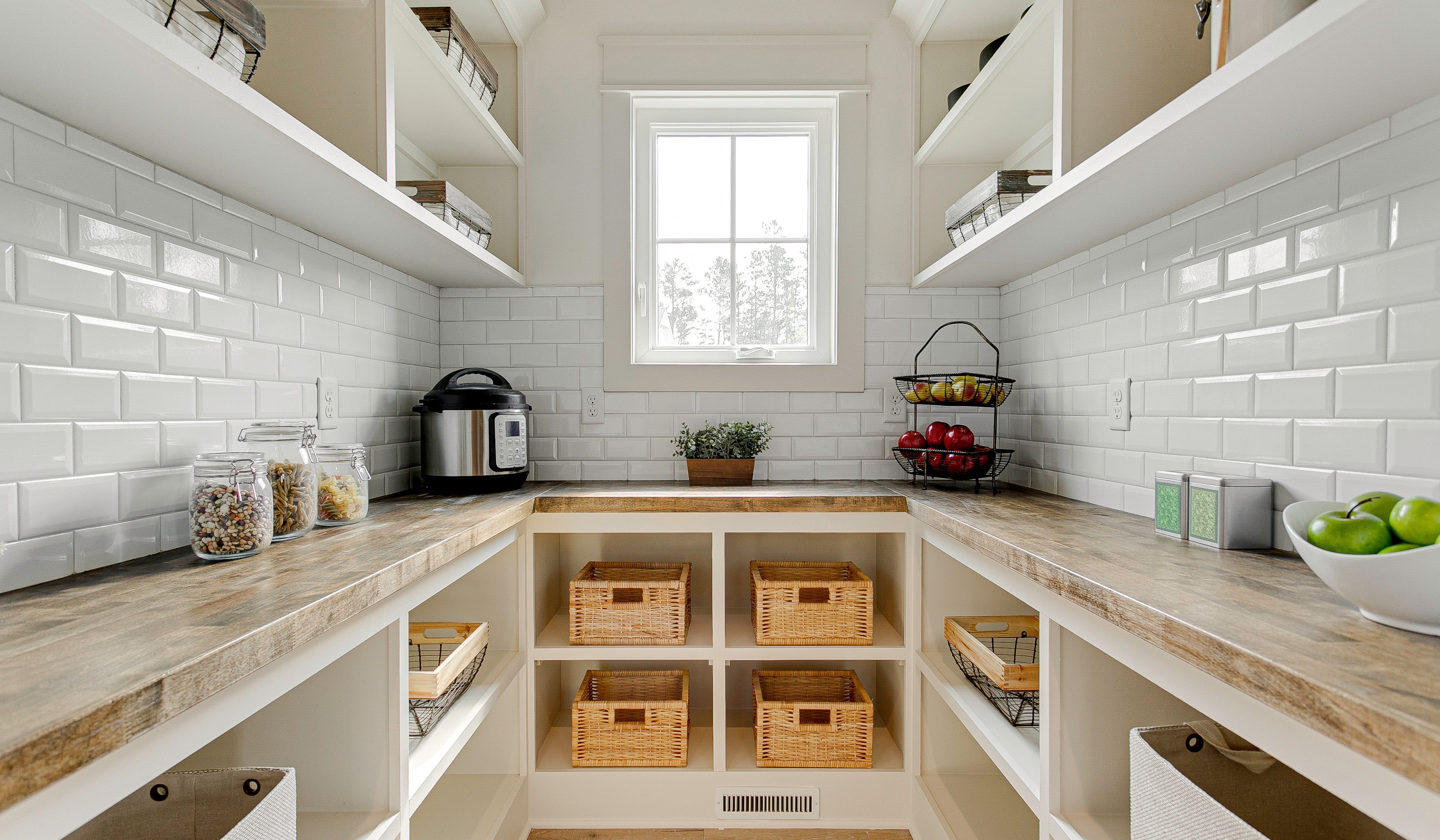 Explore custom pantry ideas for Fredericksburg homes, including shelving, pull-out storage, appliance stations and solutions for small or unusual spaces.